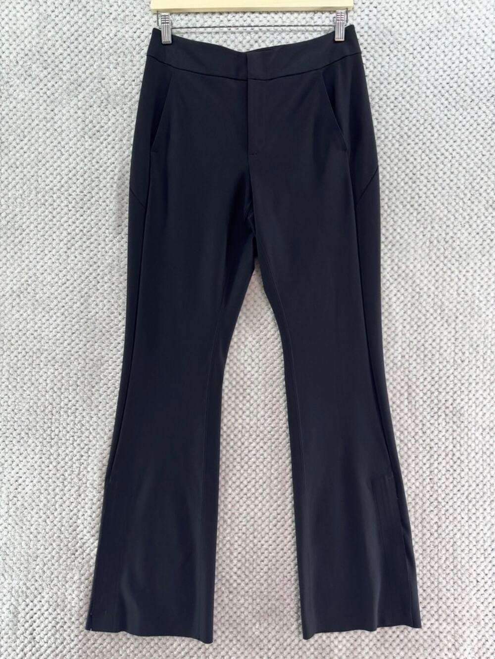 Athleta Stellar Flare Trouser Activewear Pants Womens 8 Black Zip Hem Pockets